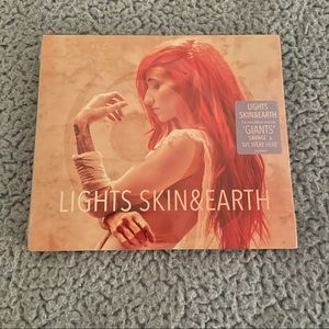 Skin and Earth by Lights